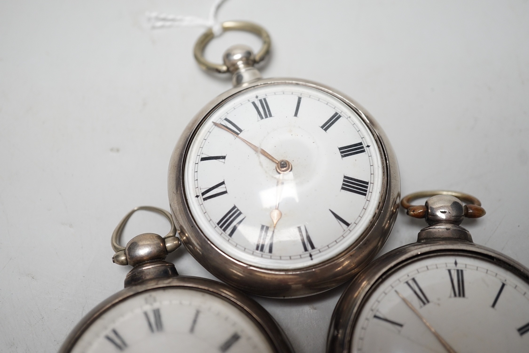 Three 19th century silver pair cased keywind verge pocket watches by Marriott of Northampton, George Bates of Kettering and Carter of Salisbury.